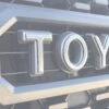 Grille Letter Overlays Fits 2016-2023 Toyota Tacoma -Car Parts Shop TAC003 GGY G OPACITY