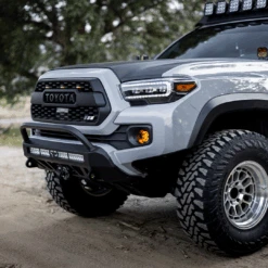 Stealth Bumper For 2016-2023 Tacoma 25 Stealth Bumper For 2016-2023 Tacoma -Car Parts Shop tacoma stealth bumper closeup 17in wheel 33in tire detail